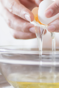 A Person Separating Egg White