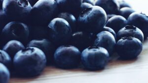 Blueberries Lot Above Beige Wooden Surface