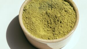 Brown Ceramic Bowl with Matcha Powder