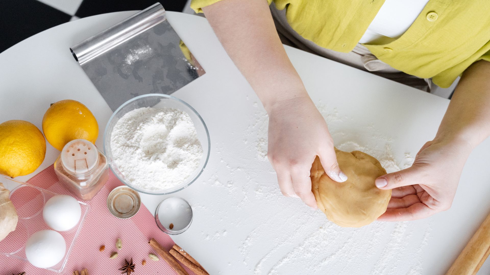 Crop woman making homemade cookies