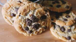 Cup of Coffee and Cookies on Table