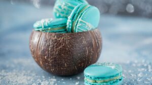 Delicious macaroons in coconut shell