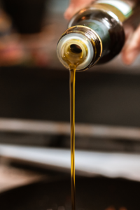 Person Pouring Olive OilBy RDNE Stock project from Pexels