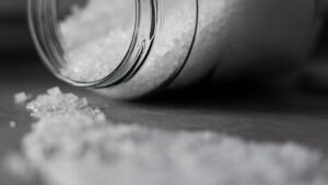 Selective Focus Photo of Salt in Glass Jar